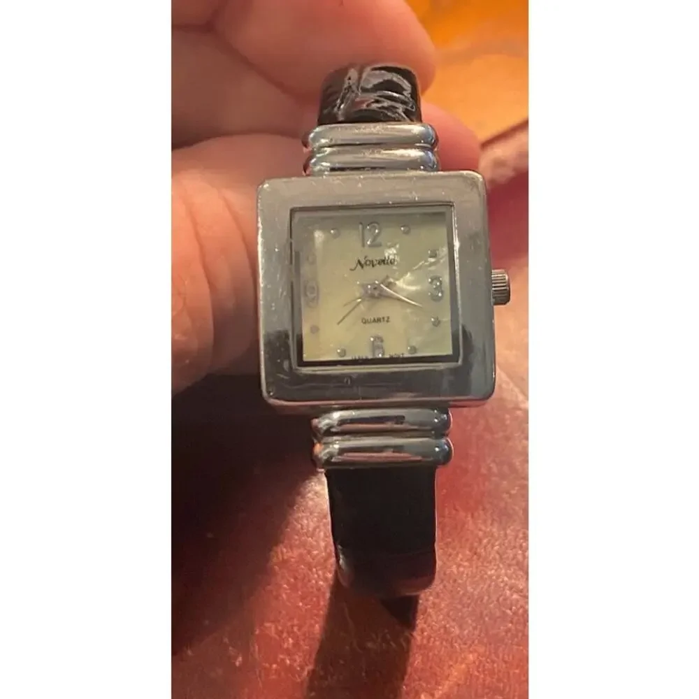 Women's Silver Tone Novelle Watch, Bangle Bracelet with MOP Face